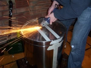 grinding skin from mash tun base with angle grinder 1