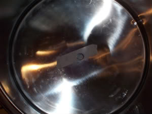 hole drilled in base of mash tun