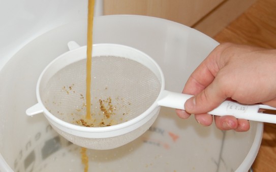 19 Straining the Hops.JPG