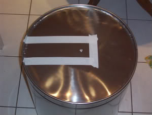mash tun with masking tape on base