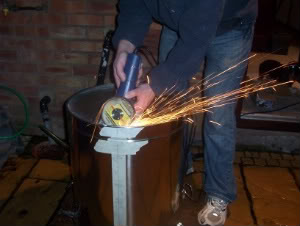 grinding skin from mash tun base with angle grinder 2